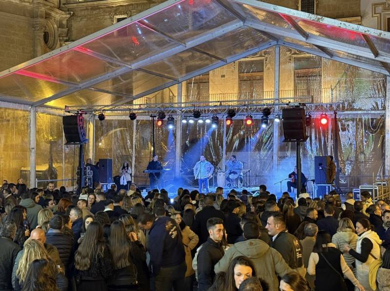 The Plaza de España in Lorca is full of people celebrating the first day of Christmas